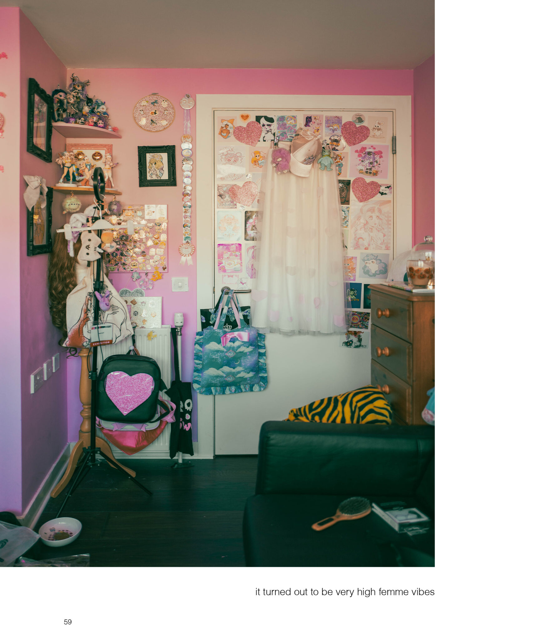A highly femme room with pink walls and a white door with love hearts