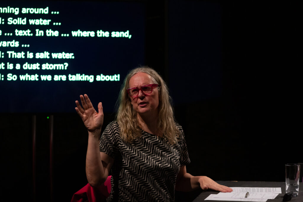 Mijke van Der Drift talks expressively gesturing with their hands