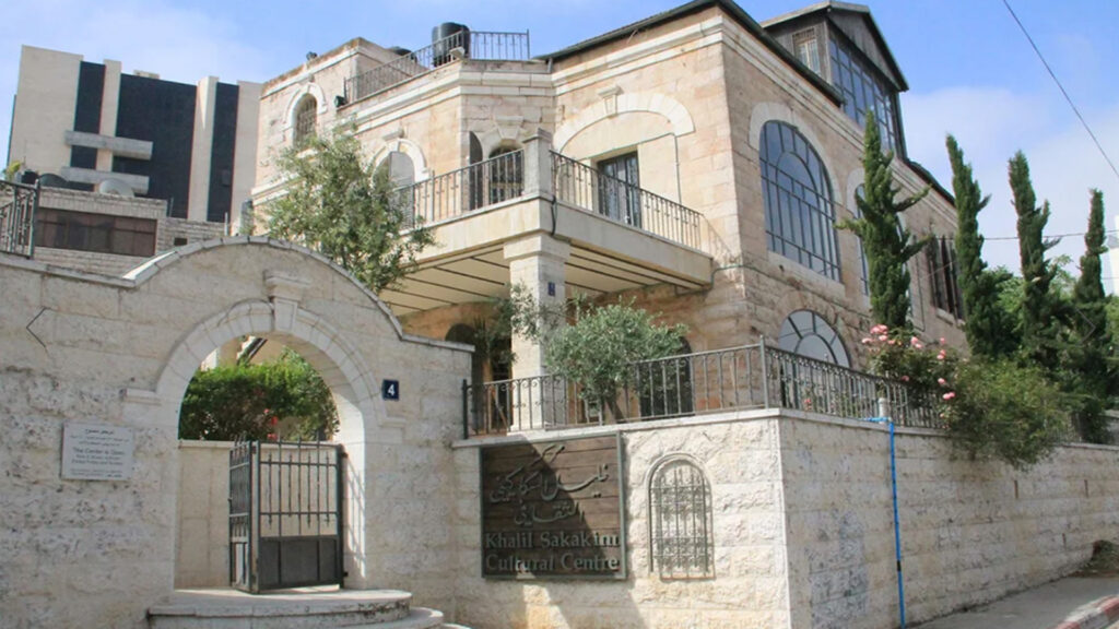 Stone building with balcony and steps in Ramallah
